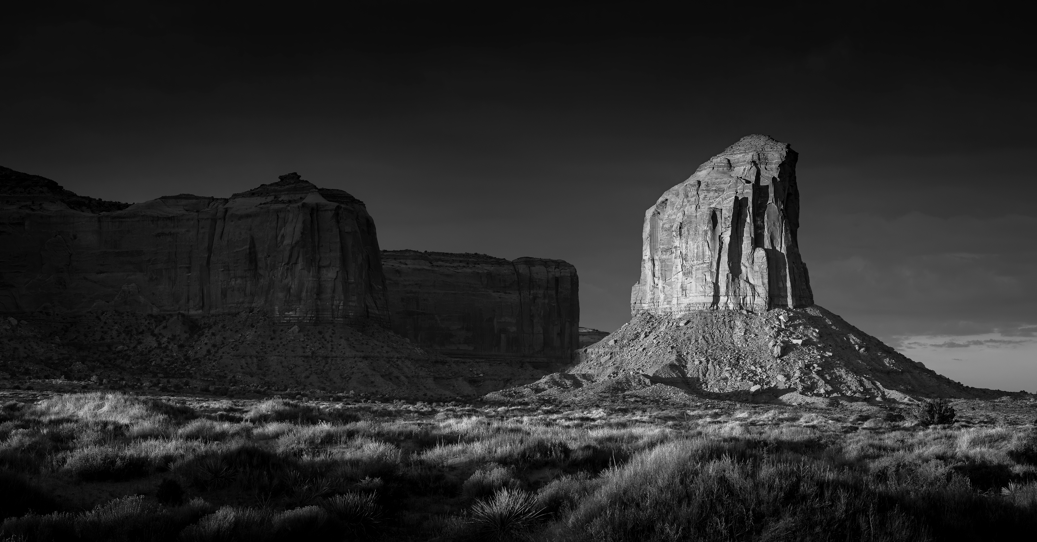 Grey Whiskers Butte lit by morning sun photographed in black and white by Jason Robert O'Kennedy. | Photo Title: Grey Whiskers Butte | 
        Photo by Jason Robert O'Kennedy ©2019