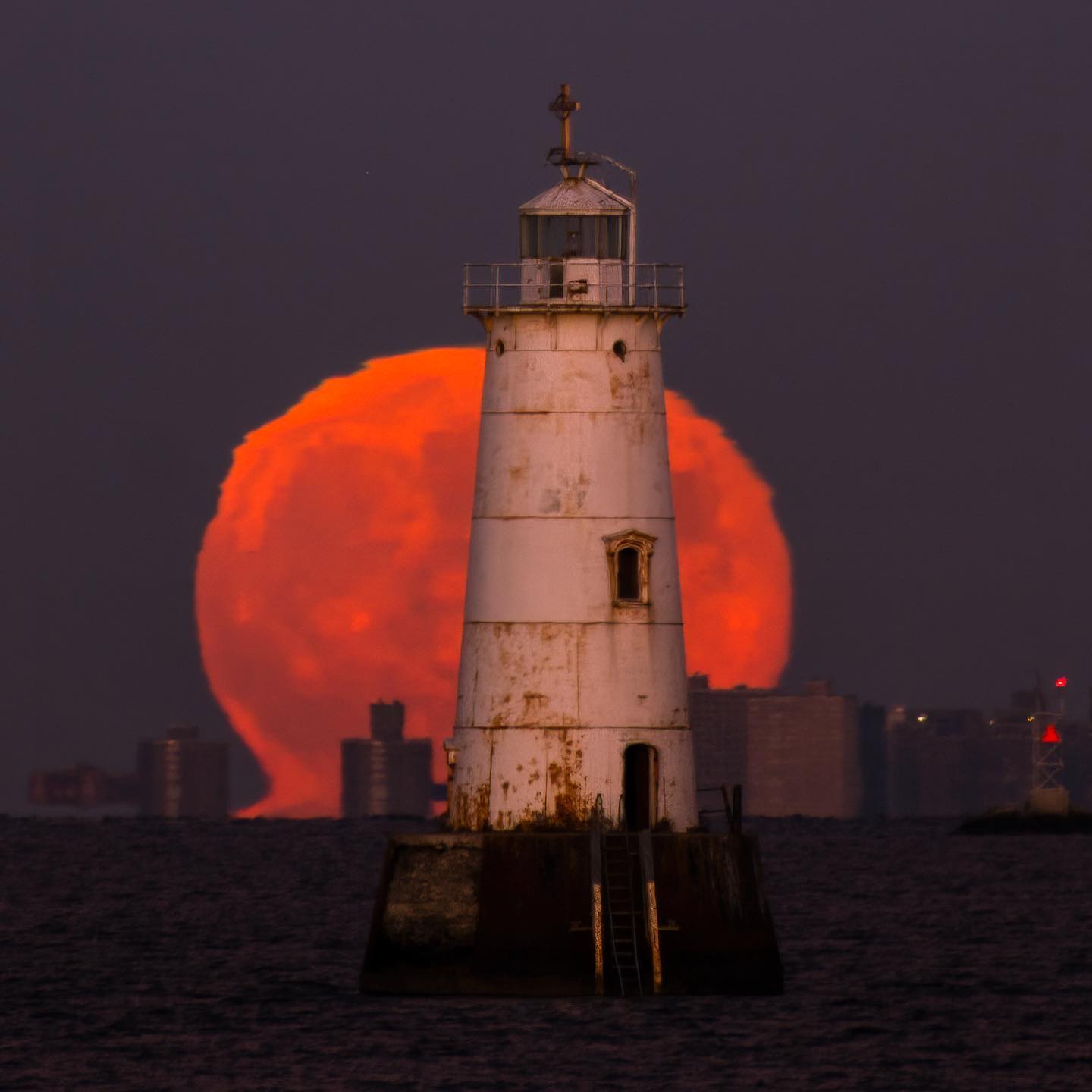 TODO-- | Photo Title: Great Beds Lighthouse Omega Moon | 
        Photo by Jennifer Khordi ©2023