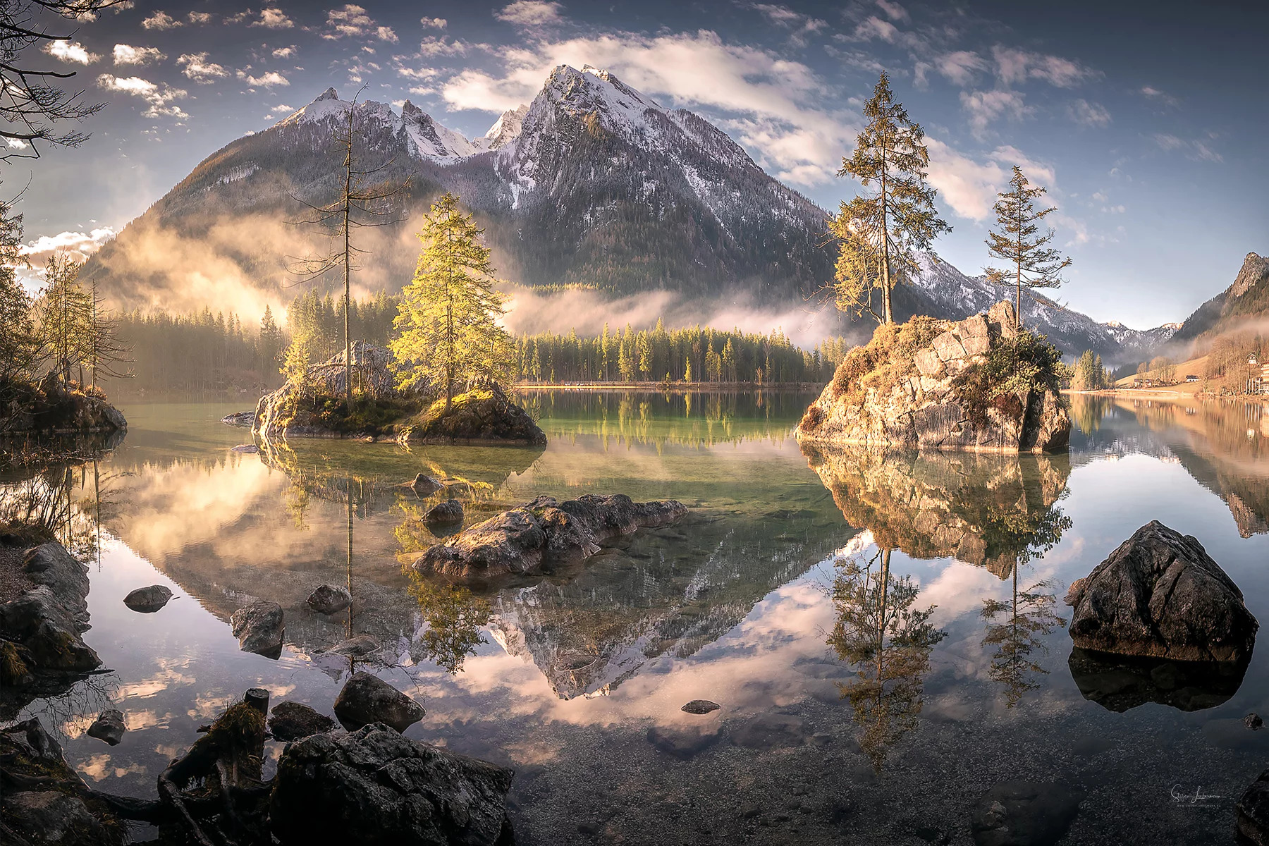 Hintersee Lake photo at sunrise with reflections of a distant peak in the Bavarian Alps | Photo Title: Hintersee | 
        Photo by Steffi Liebermann ©2020